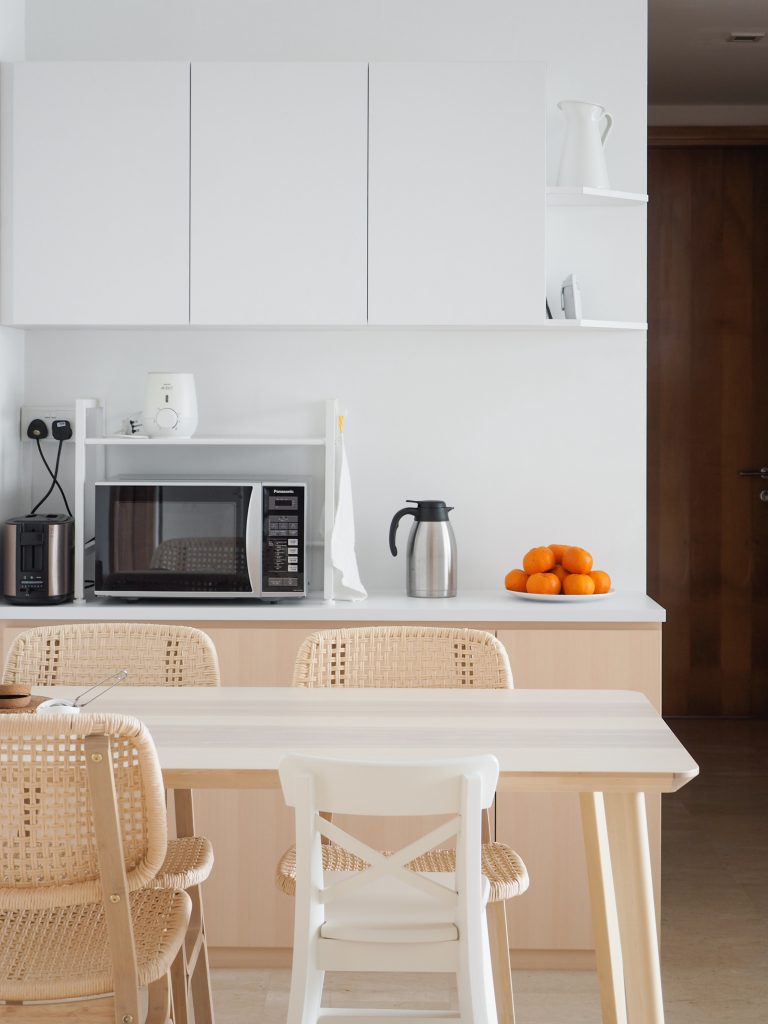 white woodgrain kitchen condo singapore